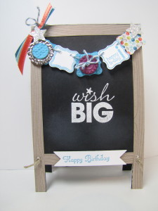 This adorable card uses the punch, co-ordinating stamp set, ribbon and buttons that are in the Sale-a-bration catalogue.